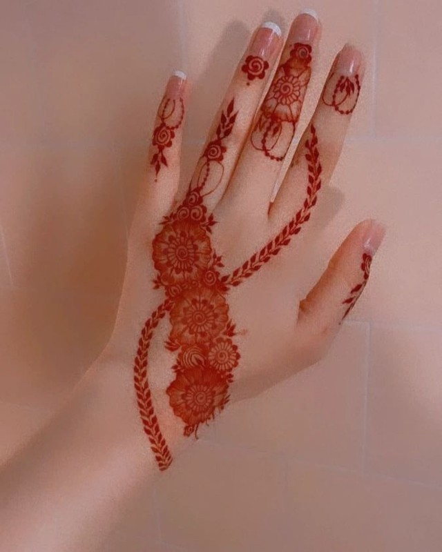 bel mehndi design back hand